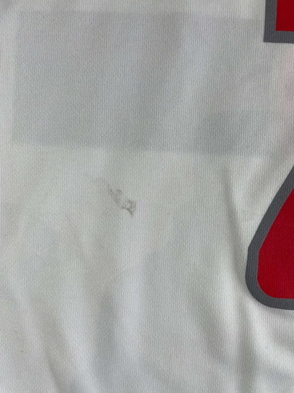 Close-up of the John Wall Washington Wizards NBA Jersey showing a small mark on the classic white fabric.