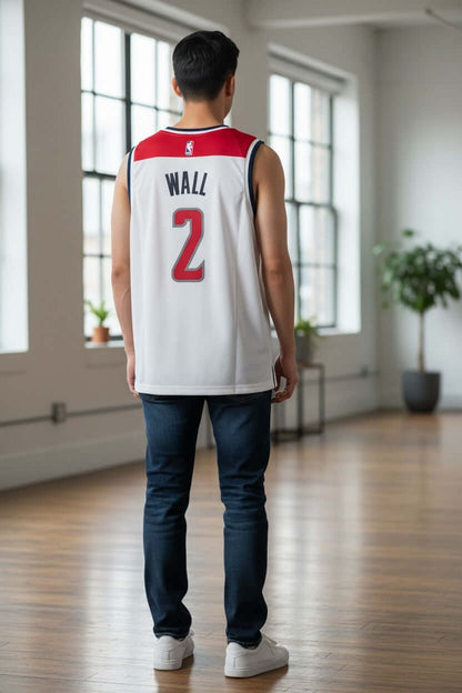 John Wall Washington Wizards NBA Jersey – White – Pre-Loved displayed on a person from the back in a bright indoor setting.